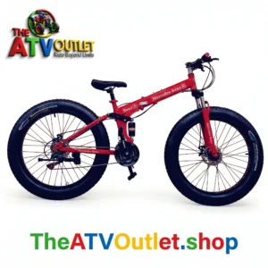 Outdoor trail view of a fat folding cycle fitted with front and rear mudguards, frame bottle holder, and rider wrist protection gear